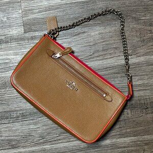 Coach clutch, golden tag pebbled leather